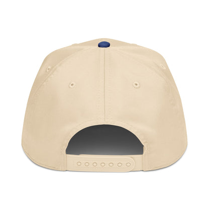 Beige cap with a blue button on the back against a white background