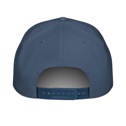 Blue cap with 'Richardson' branding on a white background
