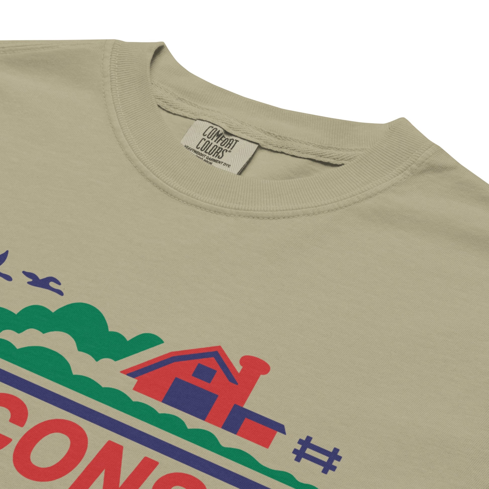 Beige t-shirt with colorful graphic design and 'Comfort Colors' label.
