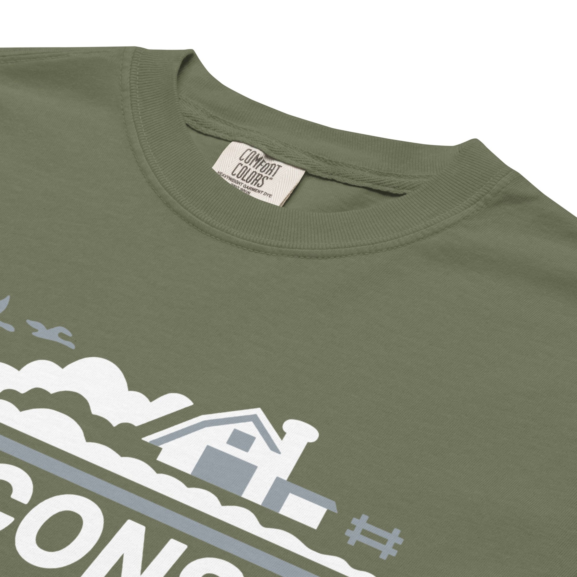 Green t-shirt with a graphic design and 'Comfort Colors' label on a white background